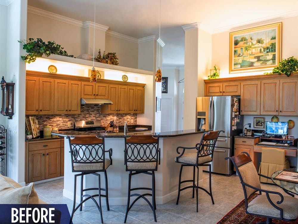 Before photo of a cabinet refacing and kitchen remodelling done by Cornerstone Builders